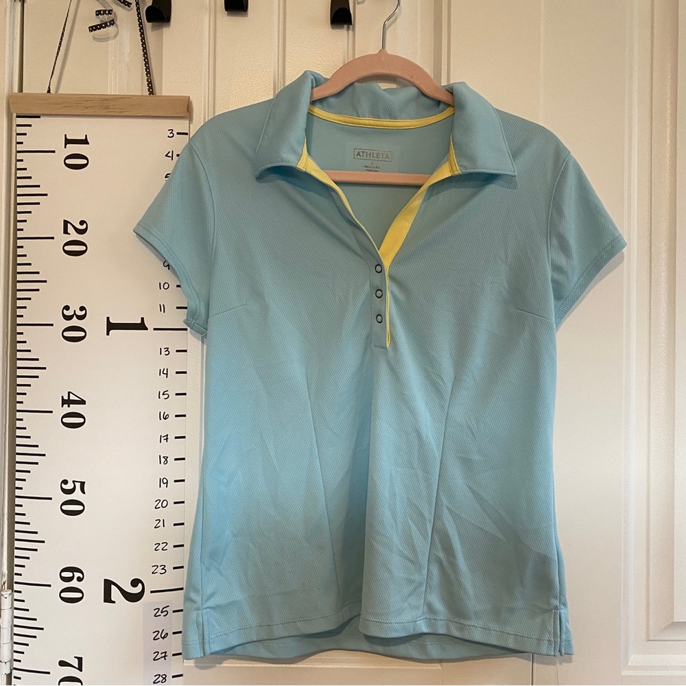 Athleta baby blue everyday polo with yellow piping GUC preloved